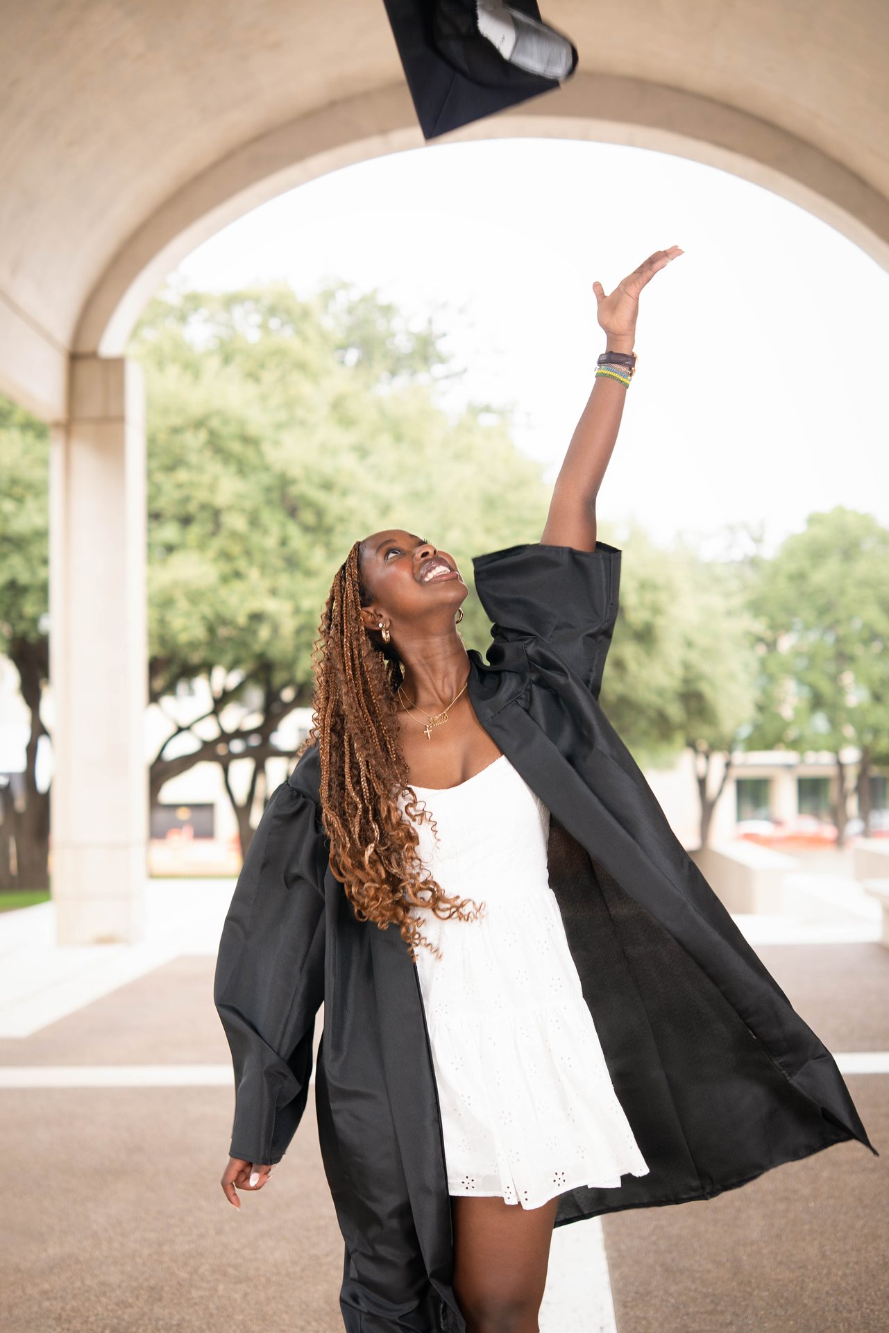 Graduate in cap and gown portrait, DFW photographer by Rayala Photo